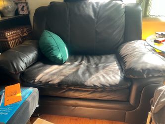 Giant brown leather chair.