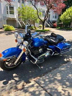 Pacific Blue Road King ,  2008 Police edition.  There 100 year anniversary. Runs great. Must see. Removable windshield for a sporty ride around the ci