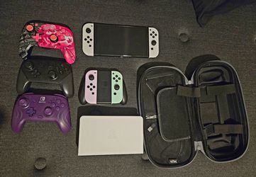 Nintendo switch OLED with controllers