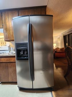 Kenmore Stainless Steel side by side refrigerator