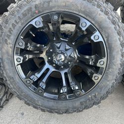 BRAND NEW SET OF FUEL WHEELS AND MUD TIRES FOR JEEP/CHEVY OBS