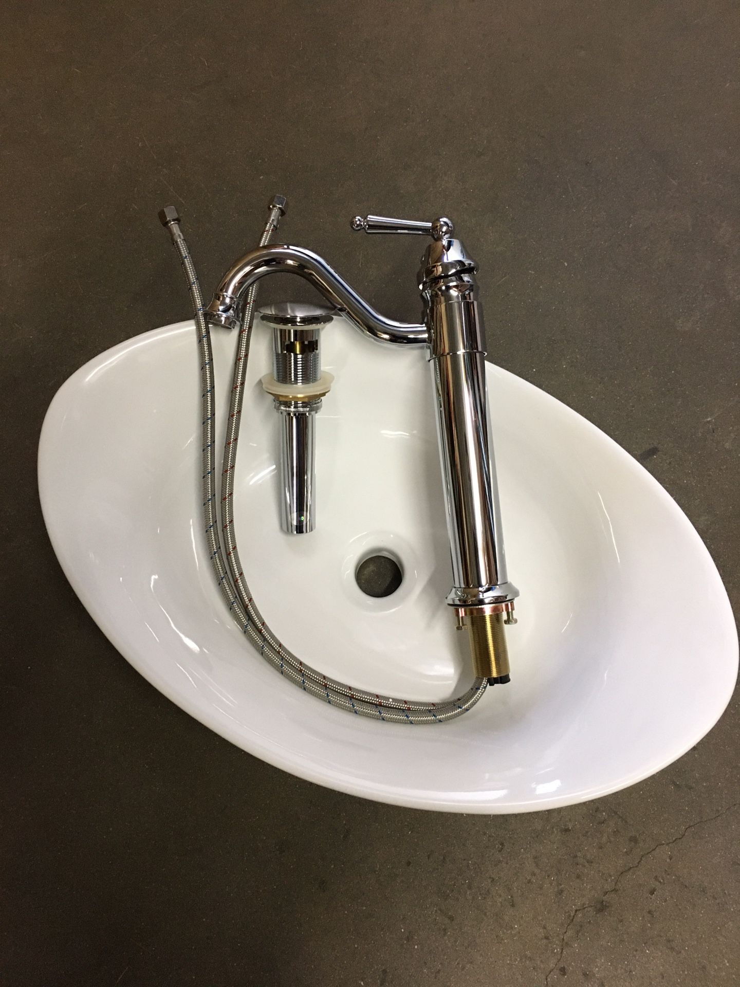 New in Box $60 chrome color single handle bathroom faucet egg shape vessel sink with pop up drain 