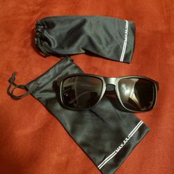 Pair Of Black Polarized Sunglasses