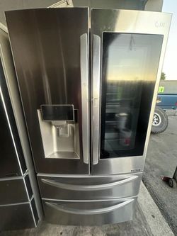 LG INSTAVIEW STAINLESS STEEL DOOR IN DOOR 4 DOOR REFRIGERATOR WITH CUBE AND CRUSHED ICE 