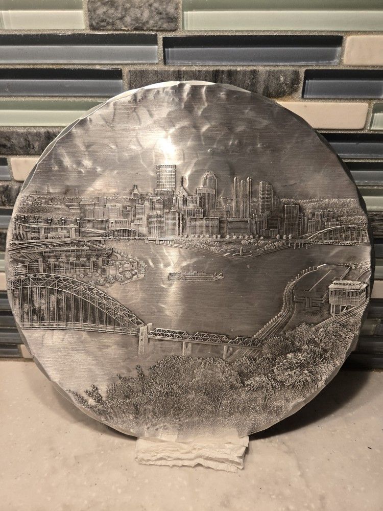 Wendell August Forge Decorative Round Plate Featuring The Pittsburgh Skyline.