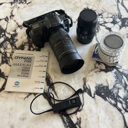 Film SLR camera - Minolta 550si, two lenses, multiple filters, camera case