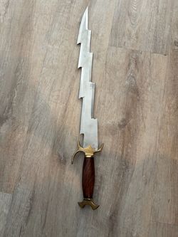 *Fantasy Sword with Serrated Blade and Wood Handle