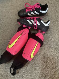 Kids soccer cleats size 13 and brand new shin guards