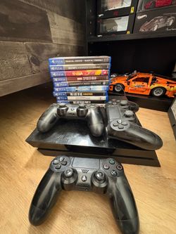 PS4, 3 controllers, couple games