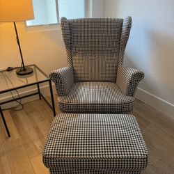 STRANDMON Armchair and ottoman, Vibberbo black/beige