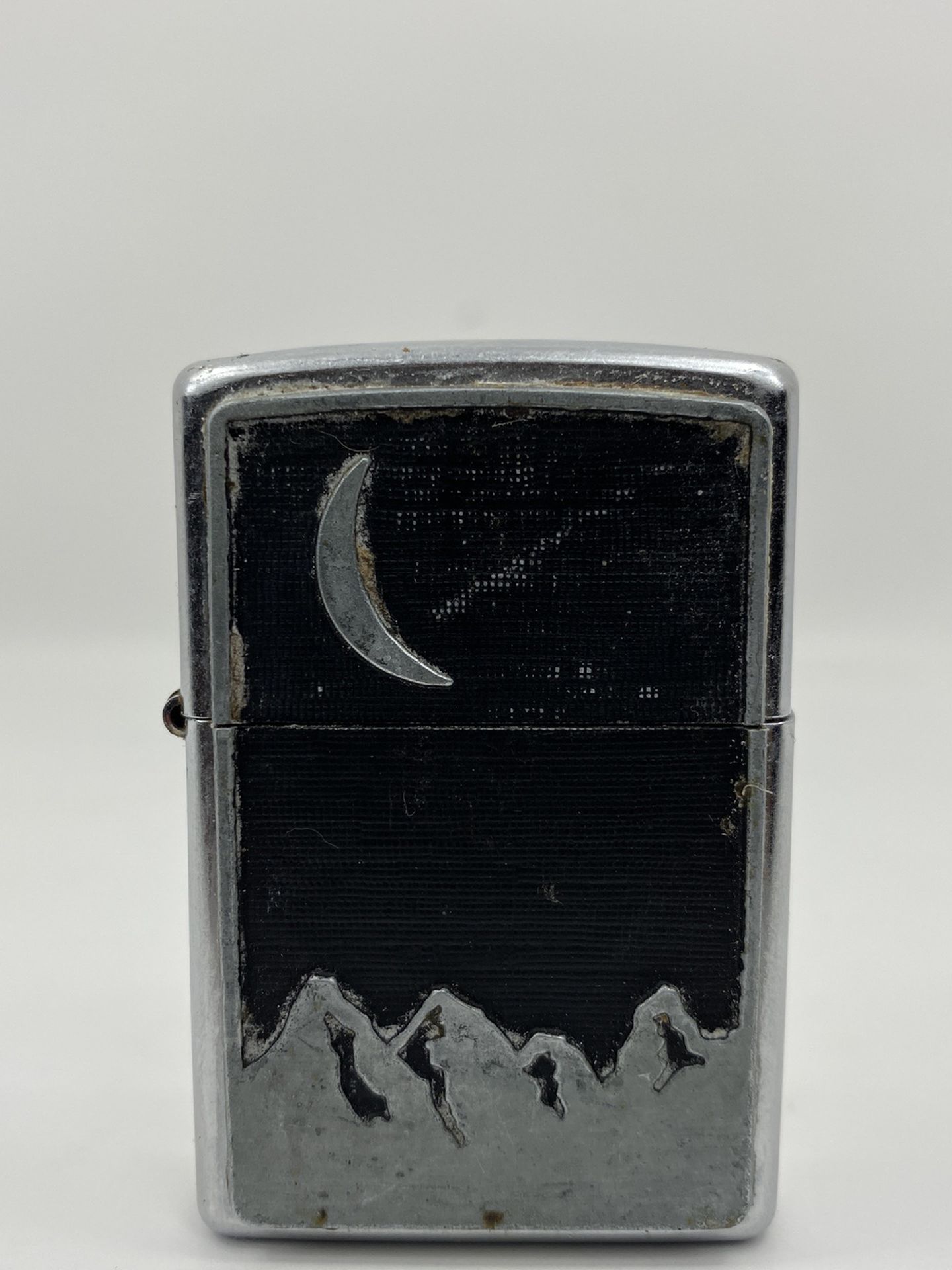 2000 ZIPPO BRADFORD PA CRESCENT MOON AND MOUNTAINS LIGHTER