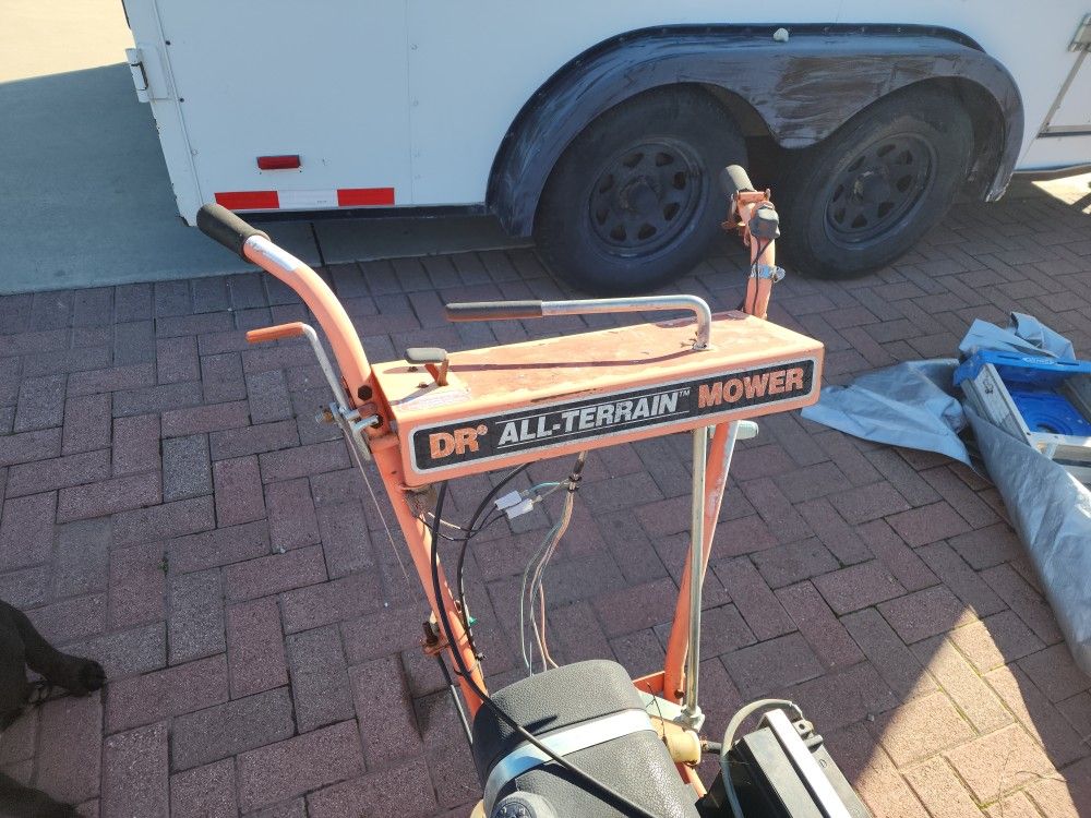 D.R Brush Mower Automatic start, needs battery.