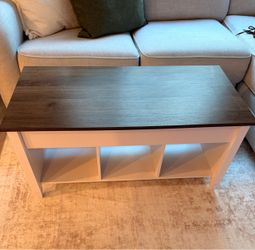 Coffee table with lift top storage