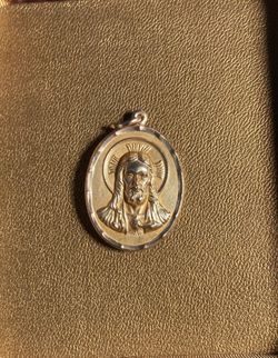 Two sided 10k pendant