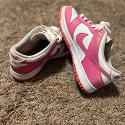 Pink and white Nike dunks