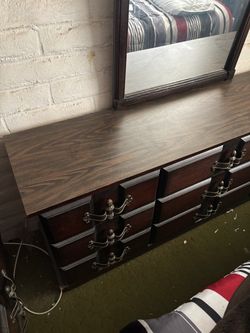 Dresser set one long and 2 side pull out dressers open to offers