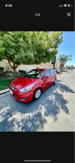 Hyundai Accent Hatchback – Red