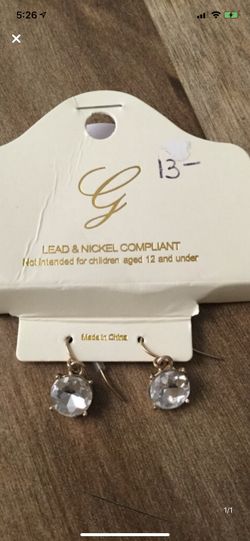 Pair of gold-colored and diamond hook earrings