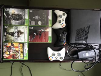 Xbox 360 with 3 controllers and 5 games
