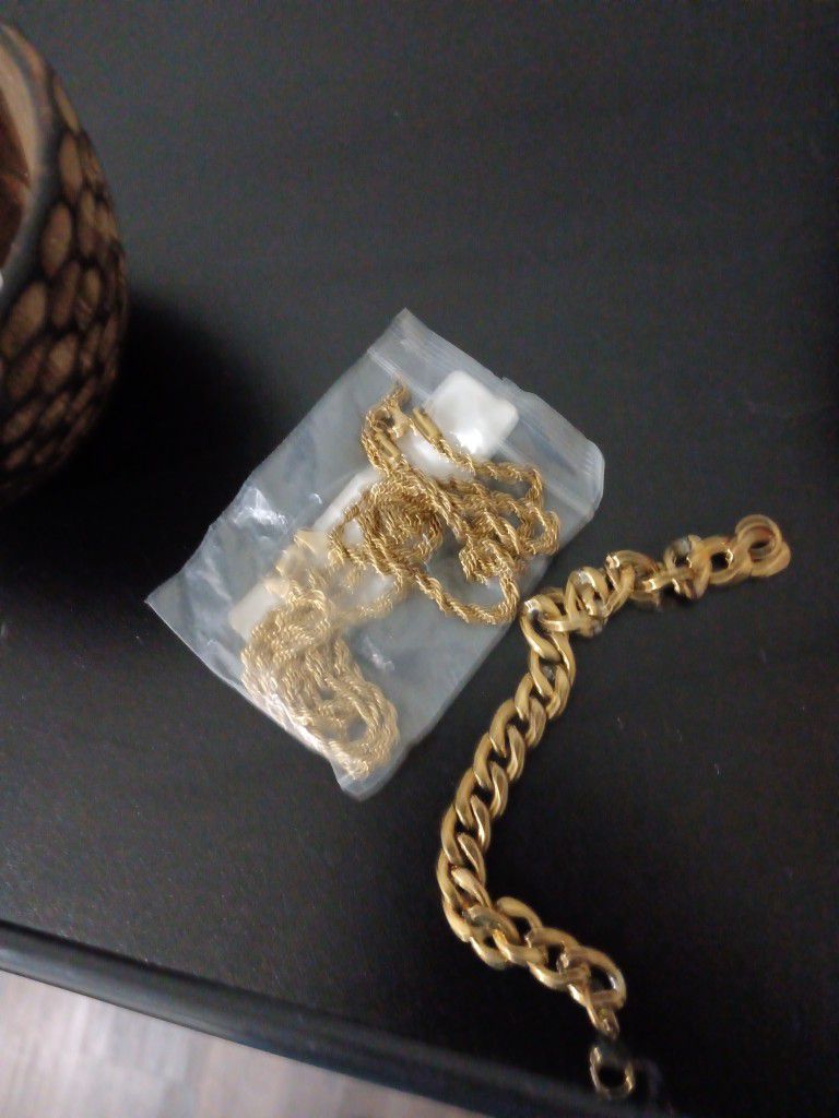 gold girls bracelet and broken neck