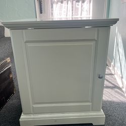 White cabinet for shows, entry, or kitchen