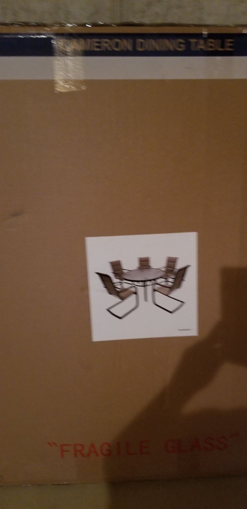 New in box 5 chairs and round patio glass table moving dont need