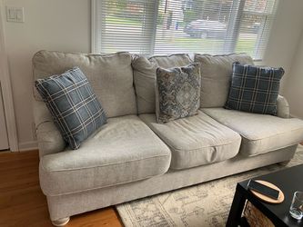 Two sofas and one chair