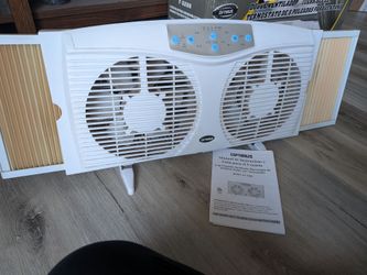 Electric reversible twin window fan with thermostat!