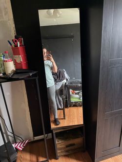 Mirror with jewelry and storage space