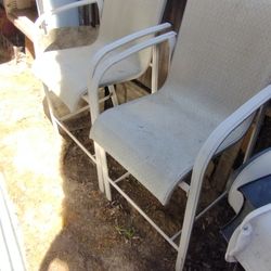 Three chairs and a table