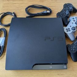 Playstation 3 with controllers and many games