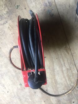 Air compressor hoes holder