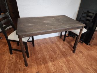 Table and 2 matching chairs i have a 3rd chair you can have free !