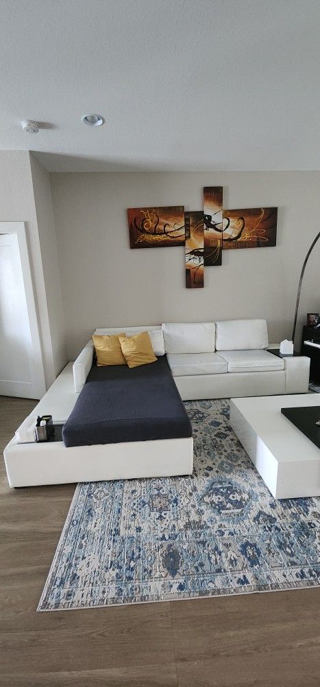 White Leather Sectional With Storage And Light