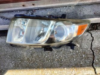 2009-2014 Scion Xb headlight (driver's side) OEM.