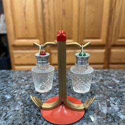 Vintage Metal Anchor Nautical Theme Stand Caddy with Glass Ship Lanterns Pair Of Glass Salt and Pepper Shakers. Size approximately 4 1/4 inches tall. 