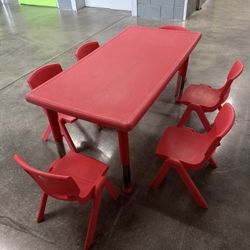 Adjustable red plastic activity table, 24 inches wide x 47 inches long 