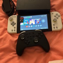 Nintendo Switch With Micro Sd Card And A Game Card