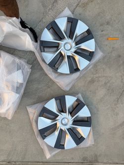 Brand new Tesla Model Y hubcaps