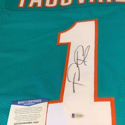 TUA TAGOVAILOA Brand New Autographed XL Miami jersey Beckett COA