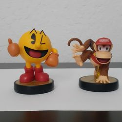 Pac-Man and Diddy Kong amiibos from the Super Smash Bros series.