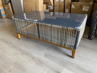 Outdoor patio coffee table with glass