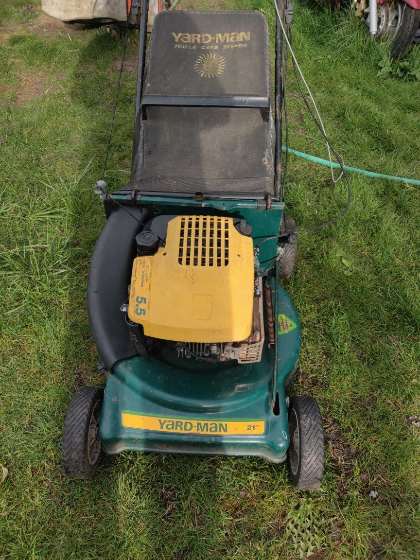 21 inch yardman 5.5 horsepower lawn mower three in one with bag for