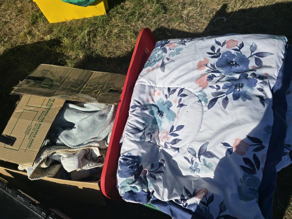 3 Tubs/Boxes Of Blankets
