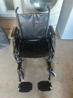 Black Manual Wheelchair with Footrests