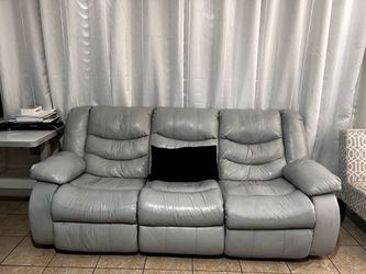 Grey leather reclining Sofa and loveseat set