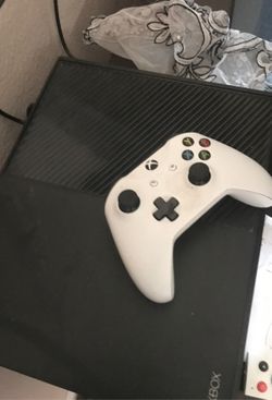 Xbox one with controller and 2 games the games are call of duty black ops 3 and portal knights