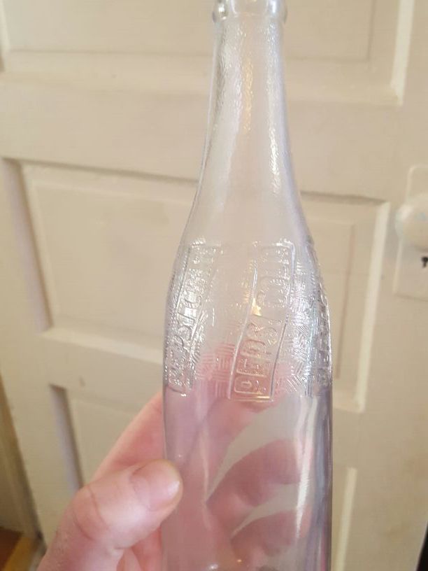 Antique Pepsi Cola swirl design bottle