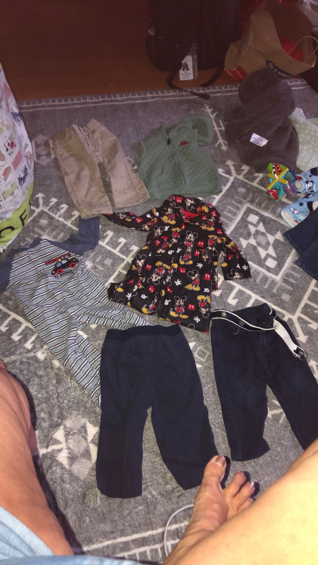 Bag of baby boy clothes, seven items in the bag