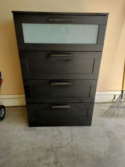 Dresser by IKEA..4 Drawers..Black..Frosted ..50 by 34 by 18